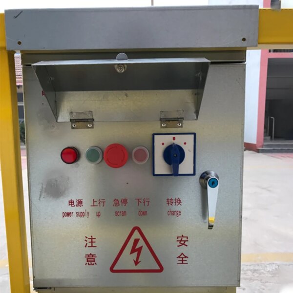 Industrial control panel with buttons, switches, warning labels, and a Wholesale aluminum alloy construction hanging basket zlp 500 zlp 630 zlp 800 rope suspended access platform for construction.