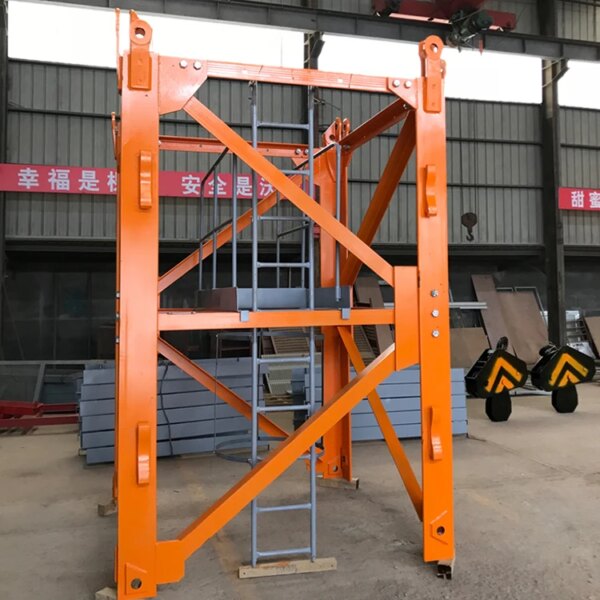 An orange China IHURMO 75 jib length 16 ton construction engineering topless tower crane inside a construction engineering warehouse.