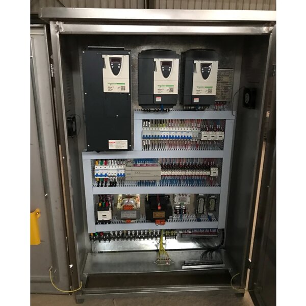 Industrial electrical panel with circuit breakers and wiring visible, located near a IHURMO china self-raising Qtz80 5613 6T construction hammerhead tower crane for sale.