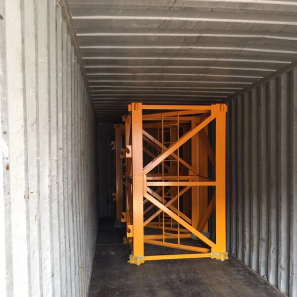 Large IHURMO CE Standard QTZ50 TC5010 City Tower Crane frame inside a shipping container.