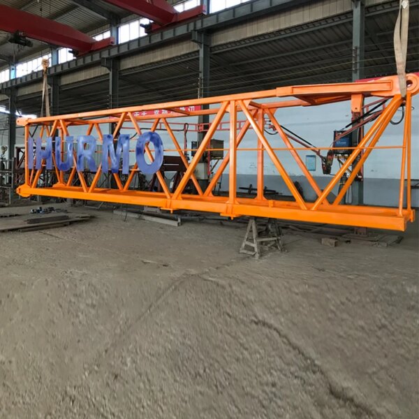 Gran viga industrial de color naranja con la palabra "China IHURMO 75" escrita en ella, ubicada en una instalación industrial que cuenta con una grúa torre sin cabeza de ingeniería de construcción de 16 toneladas de longitud de pluma IHURMO 75.