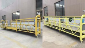 Image of mobile scaffolding platforms used in construction, featuring yellow safety rails and wheels for easy mobility. Ideal for various building projects and ensuring worker safety.