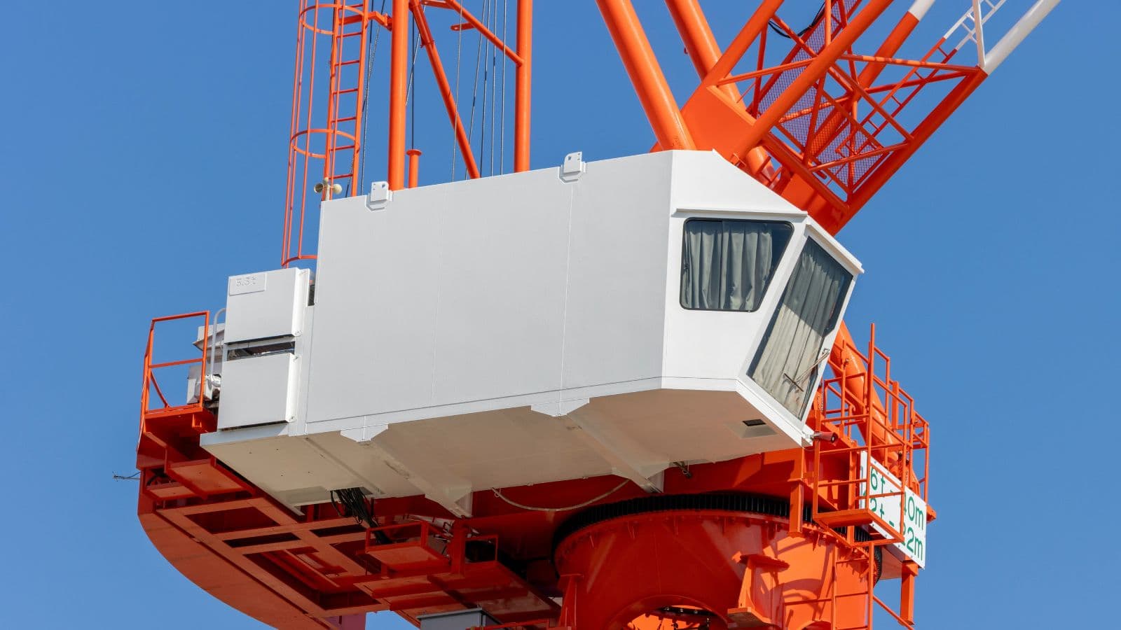 a tower crane operator cabin with electrical and control system inside